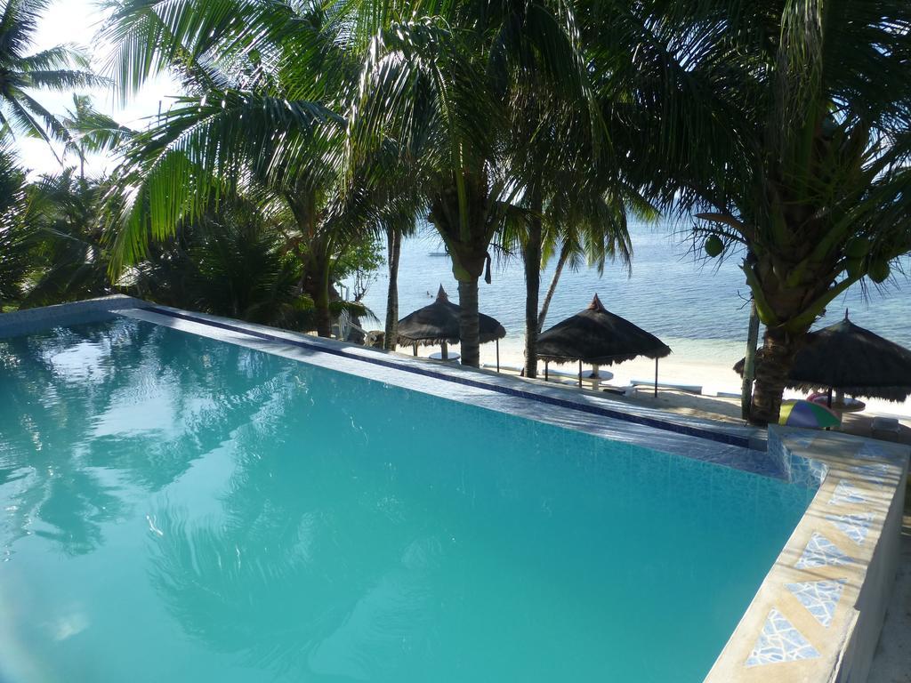 Reddoorz Premium @ Flower Beach Anda อันดา ภายนอก รูปภาพ