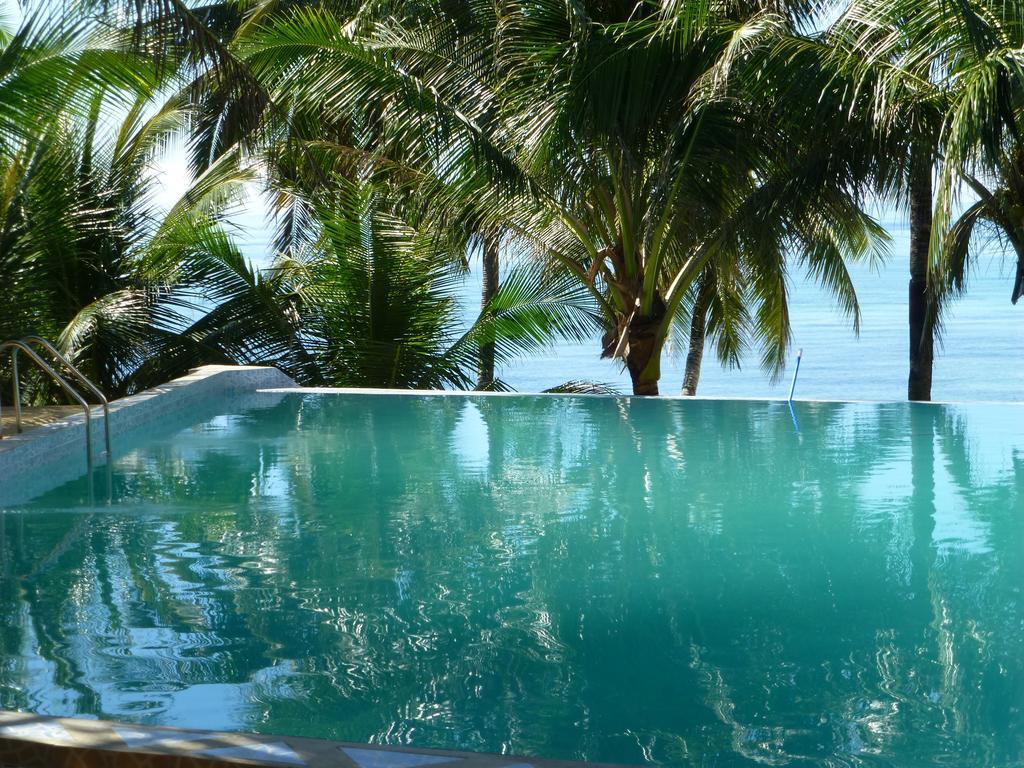 Reddoorz Premium @ Flower Beach Anda อันดา ภายนอก รูปภาพ