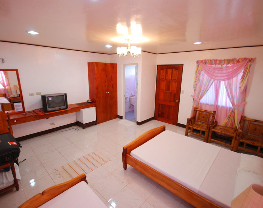 Reddoorz Premium @ Flower Beach Anda อันดา ภายนอก รูปภาพ