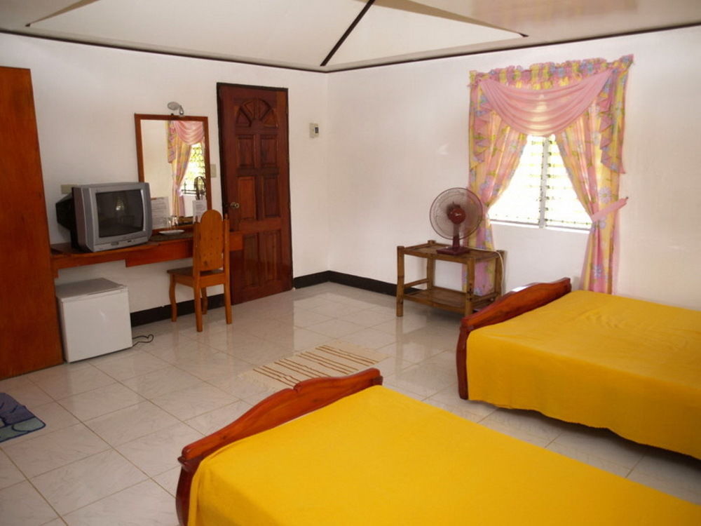 Reddoorz Premium @ Flower Beach Anda อันดา ภายนอก รูปภาพ