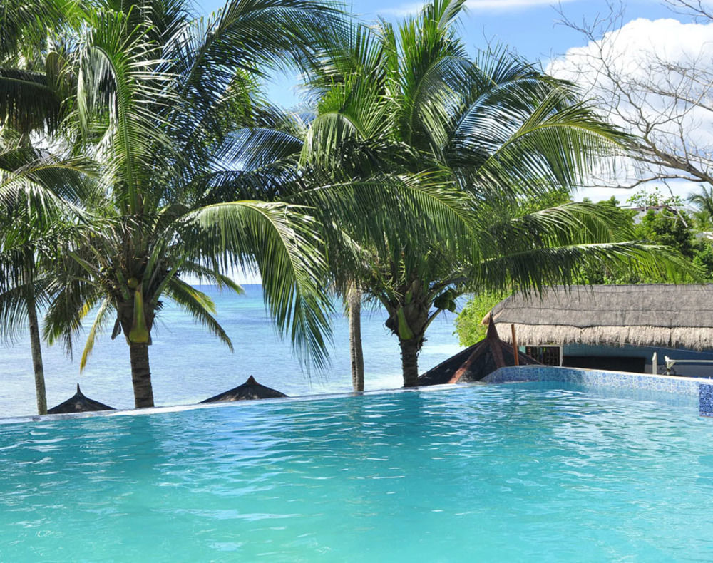 Reddoorz Premium @ Flower Beach Anda อันดา ภายนอก รูปภาพ